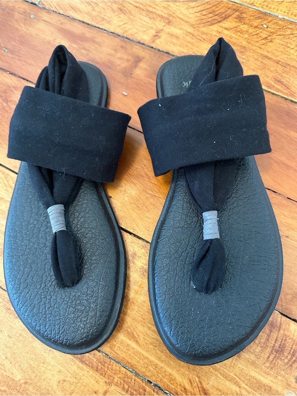 Sanuk Black Slip-On Sandal with Logo Footbed